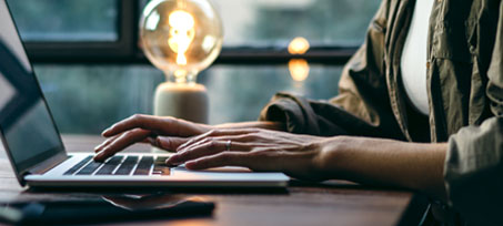 image of hands on a keyboard